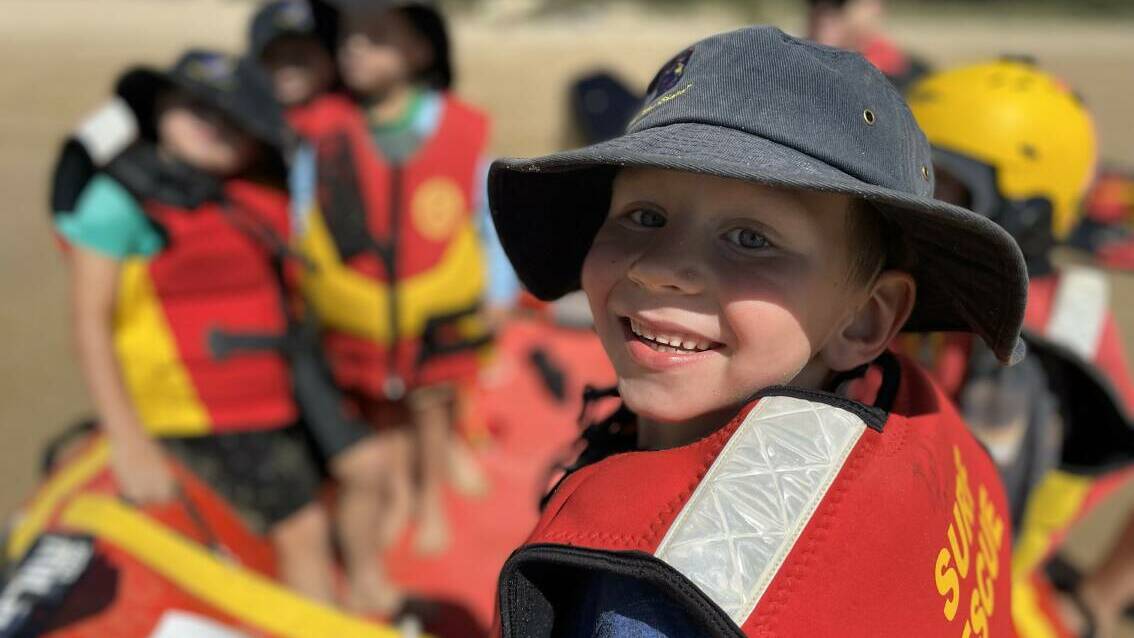 James smiles after hearing the engine of the lifesaver boat. Picture by James Parker