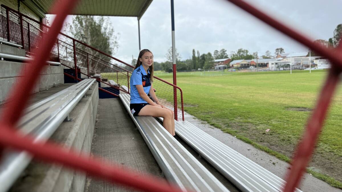 Referee Daytona Porter sits on the old Bega Recreation Ground grandstand. Picture by James Parker