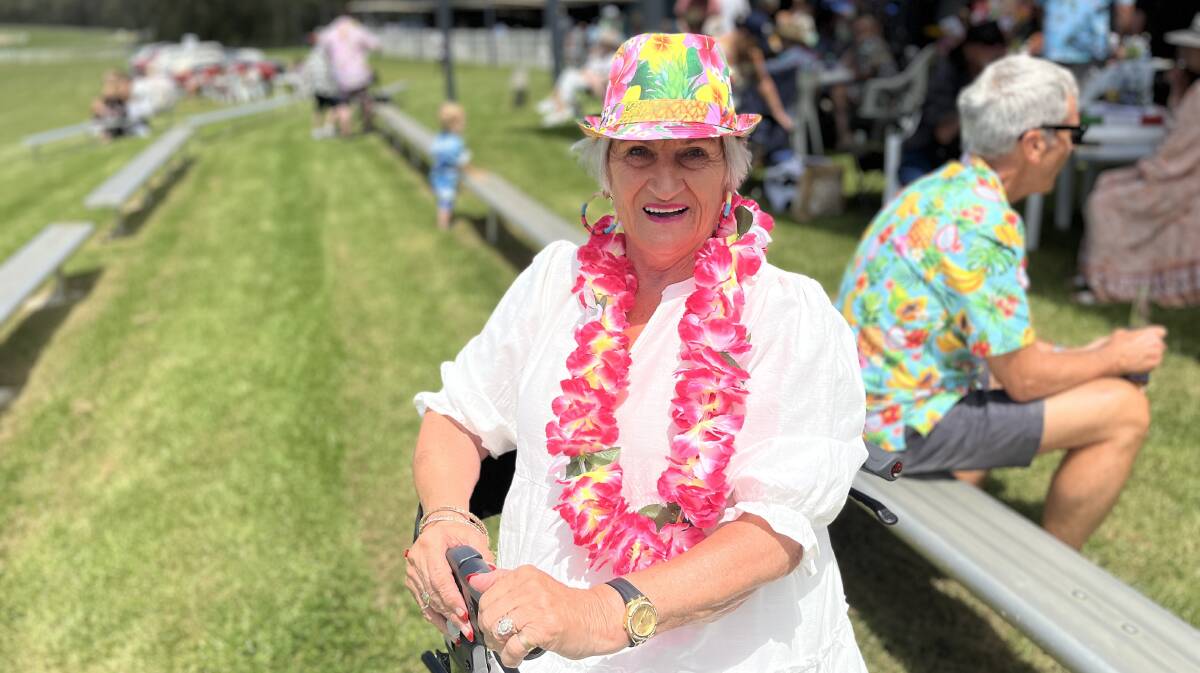 Barbara Joseph wearing Hawaiian hat and lei during Bega Cup's Saturday themed day. Picture by James Parker