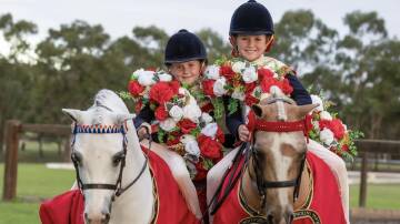 Lacey and Hallie Cowdroy after winning their age groups at Grand Nationals. Picture by Amy-Sue Alston