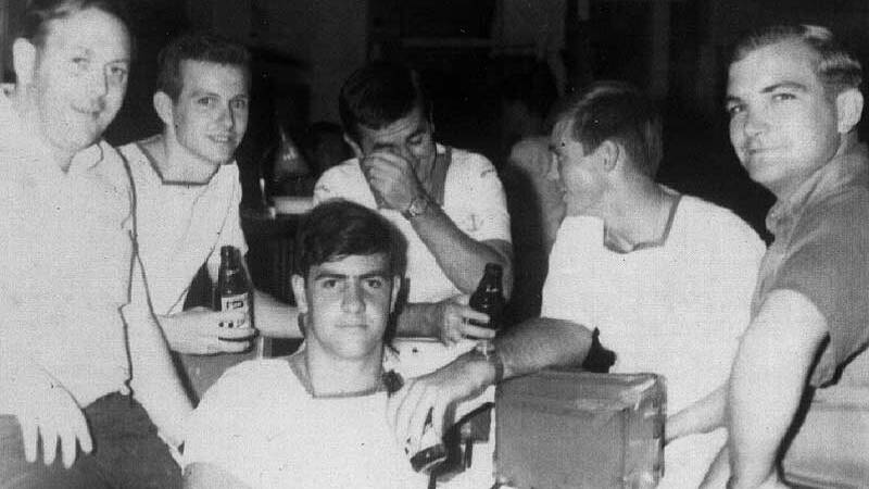 Six "Greenies" (Electrical Branch members), taken in a bar at Olongopo on 18 Feb 1969. They are rear Left to Right: Darrell Hegarty, Don Churchward, Ben Graham, unknown , and John McGrath. Picture supplied
