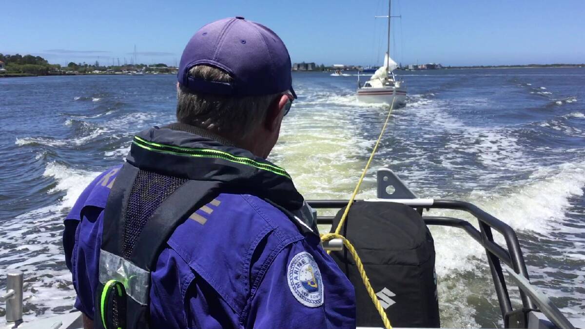 Volunteers from Marine Rescue NSW help a stranded vessel. Picture supplied