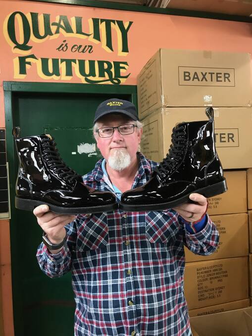 FOOTWORK: Baxter Boots employee Eddie Sivell in Goulburn with a pair of boots bound for the Australian Federation Guard. Picture: Michael Grealy