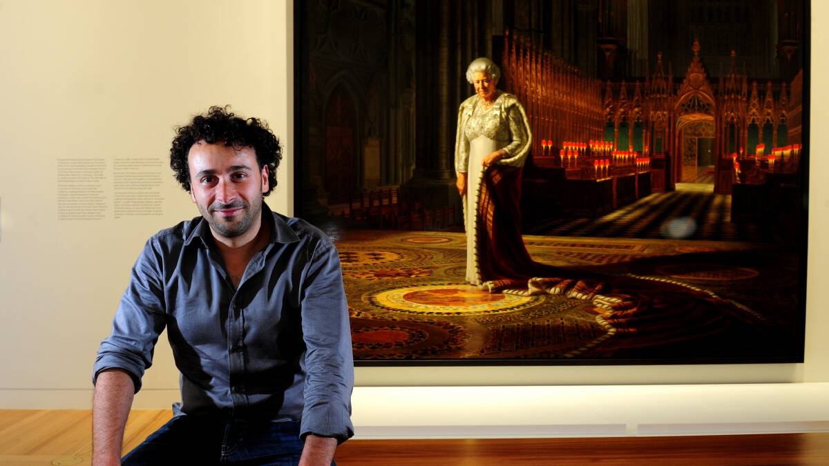 Artist Ralph Heimans in 2013 at the National Portrait Gallery in Canberra with his 2012 portrait of Queen Elizabeth II. Picture by Melissa Adams