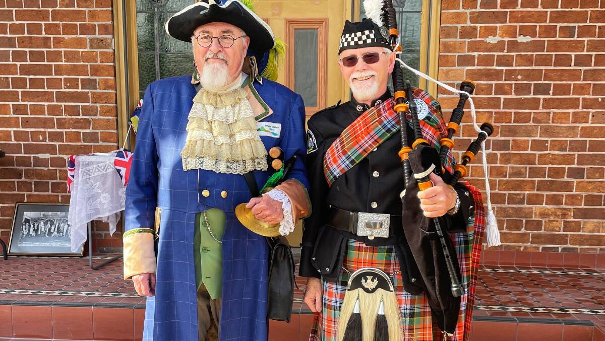 Town Crier Alan Moyse and piper John Griggs prepare to deliver the Proclamation on the steps of Eden's Hotel Australasia, June 2. Photo: Ben Smyth