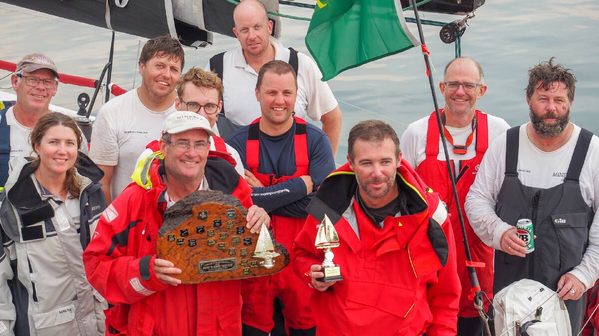 The crew of Sydney to Hobart entrant Minerva after being forced to retire to Eden. Photo: Robyn Malcolm