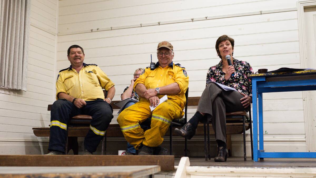 The panel for the town hall meeting, from (l-r) are Peter Reynolds (RFS Group Officer, Far South Coast Team), Daryl O'Pray (Wyndham RFS Captain) and Alice Howe (Director of Community, Environment & Planning for Bega Valley Shire Council). Photo: Michael Weinhardt