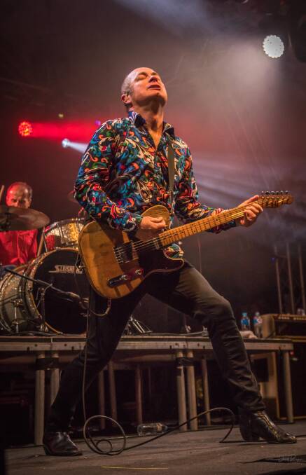 HEADLINERS: Dave Faulkner from the Hoodoo Gurus rocks the stage at last year's Band Together concert and fundraiser. Photo: David Rogers