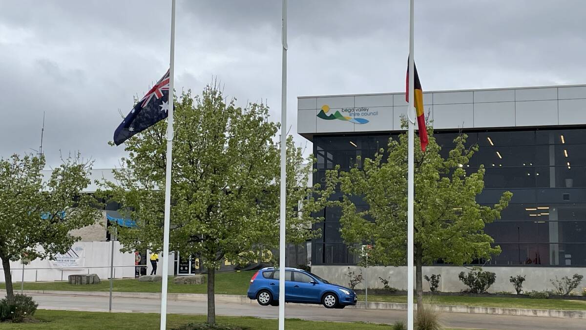 Flags at half-mast outside the Bega Valley Shire Council building. Picture by Ben Smyth