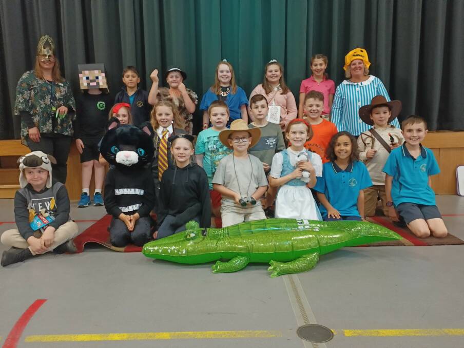 WILD MINDS: Children at St Pat's Primary School Bega show off their array of colourful character costumes for Book Week celebrations.