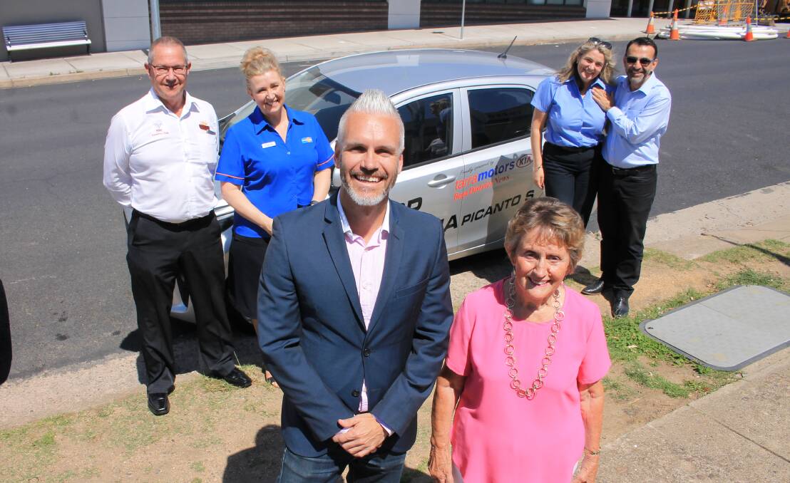 Last year's Buy Local campaign winner Lyn Murphy collects her new car. The campaign returns for Bega Valley retailers through winter and spring.