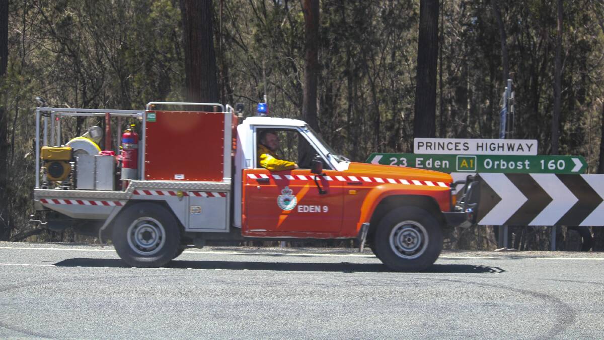 Firefighters respond to reports of spot fires near the Princes Hwy south of Eden on Wednesday, November 27.
