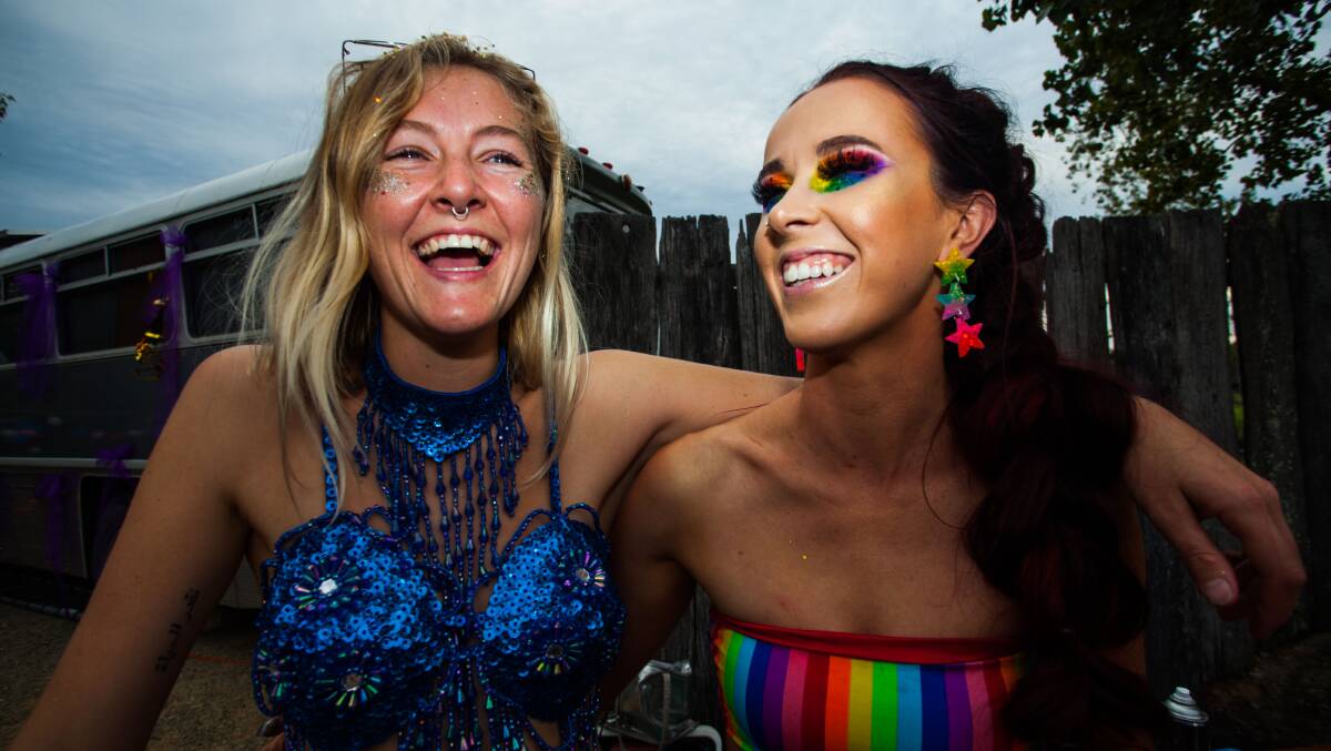 SPARKLES: Tara Matthews and Lily Ballantyne get prepared for a night of colour and entertainment at Rainbow Wave. Photo: Rachel Mounsey