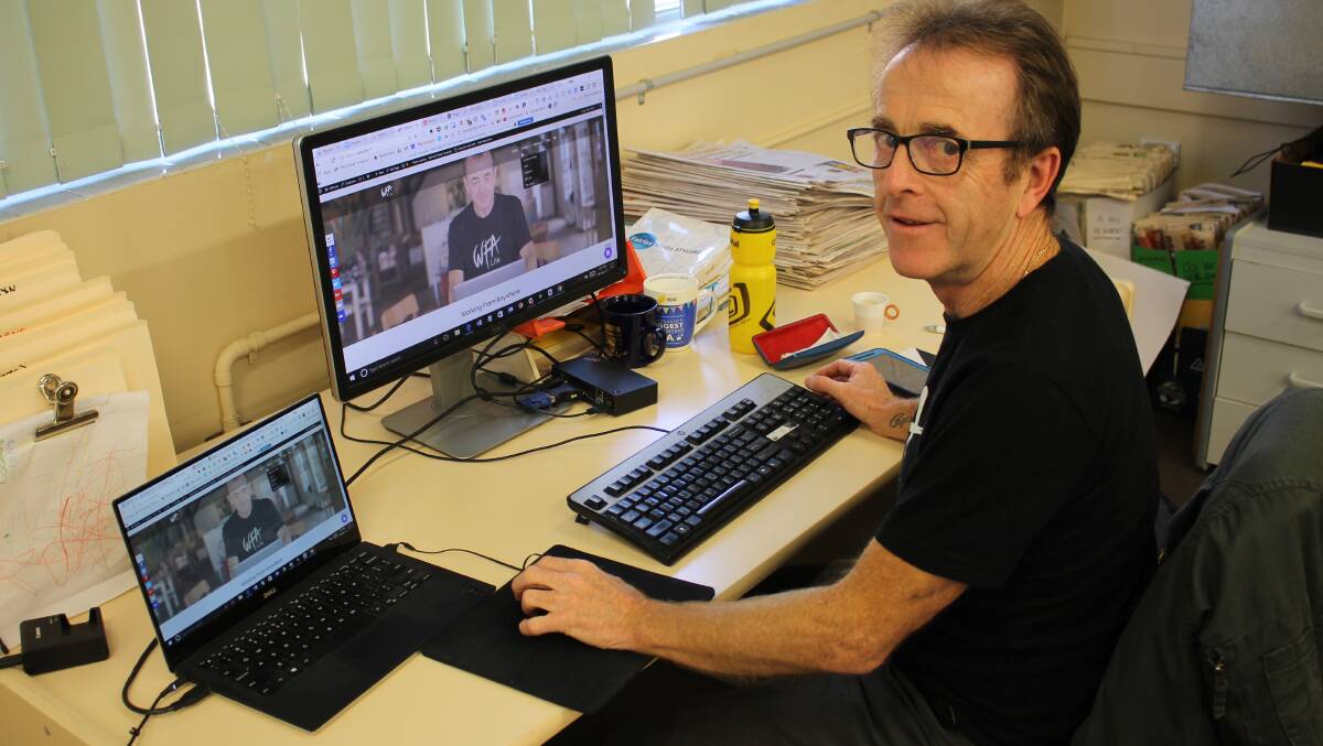 Andy Willis "works from anywhere" in the Bega District News office last Friday. The entrepreneur shares tools and tips to local small businesses.