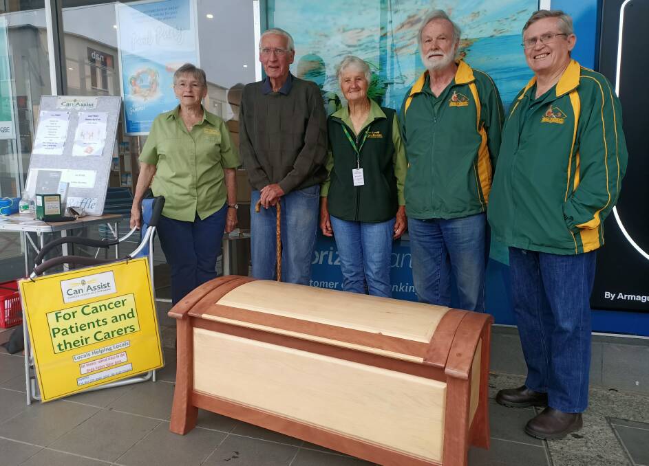 Launching Can Assist's Christmas raffle are (from left) Carol Healey, Bruce Dunlevie, Bev Koellner, Richard Kleine and Paul Healey. Photo: Ben Smyth