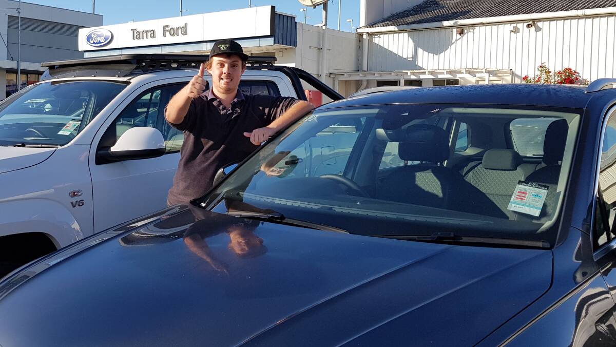 PICTURE: Nicholas Sticotti, a WorkAbility client, achieved 12 months as a yards person with Tarra Motors, Bega. His work has been praised by some co-workers. 