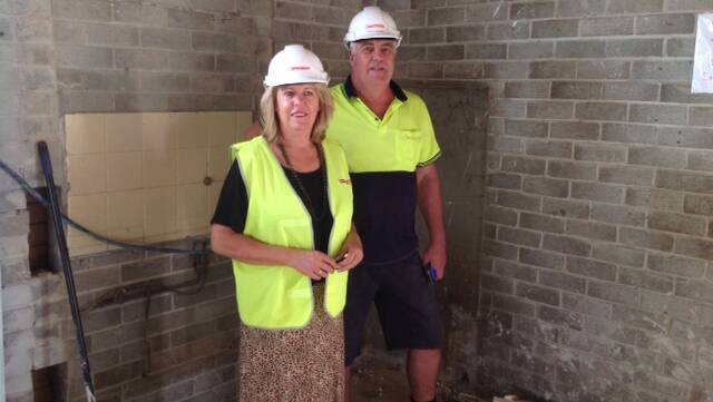 Sue Atkins (facility manager) and Gary Marsh (site supervisor) review the new kitchen area for the refurbished Hillgrove House site.