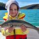 Four-year-old Maree Walker, of Greigs Flat, shows off a lovely Australian salmon taken in the Pambula River.