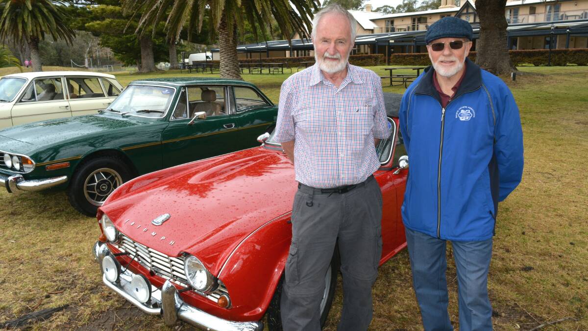 VALLEY RALLY: ACT Triumph Car Club committee members Rick Wade and Anthony Ockwell at the Seahorse Inn, Boydtown on Friday. Photo: Ben Smyth