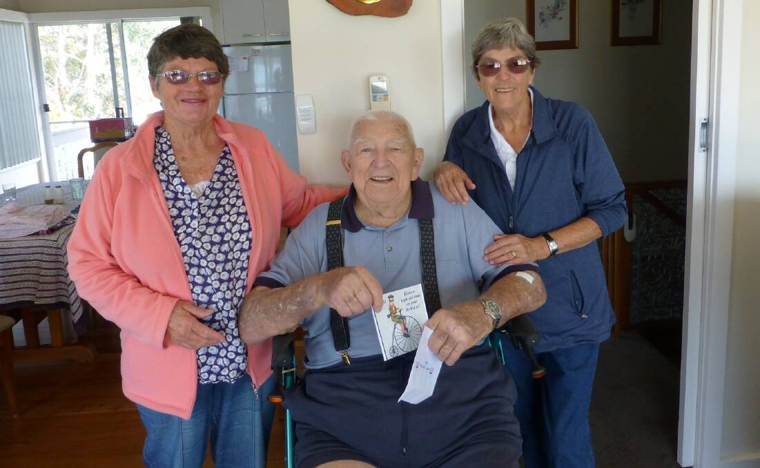 BIRTHDAY BOY: Sue Cotterill and Wendy Dunn help long-time Tathra resident Fred Pitchford celebrate his 92nd birthday on October 28 with family and friends.