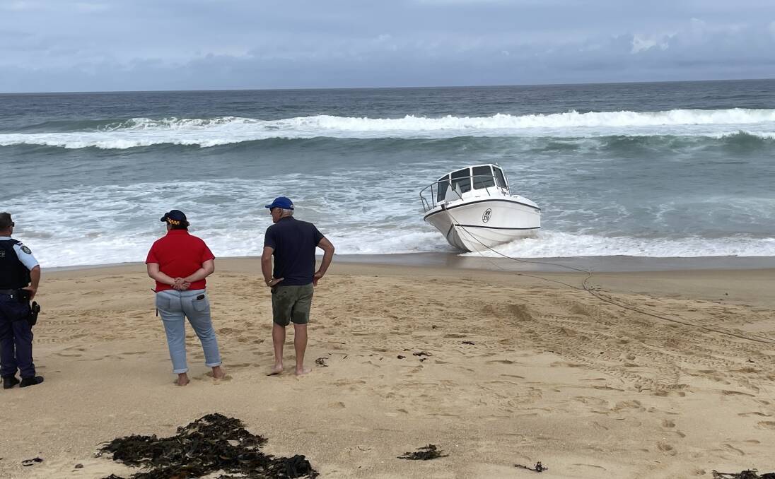 The unmanned boat washed up on Haywards Beach north of Bermagui on the NSW Far South Coast. Picture by Marion Williams