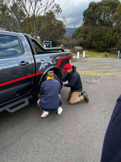 Among the lessons was how to correctly fit snow chains. Photo: Supplied