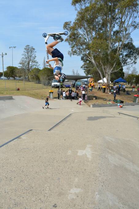 Robin Yang gets inverted during Saturday's skate and scooter session at the Bega skate park. Robin won the 14-and-under division of the trick comp.