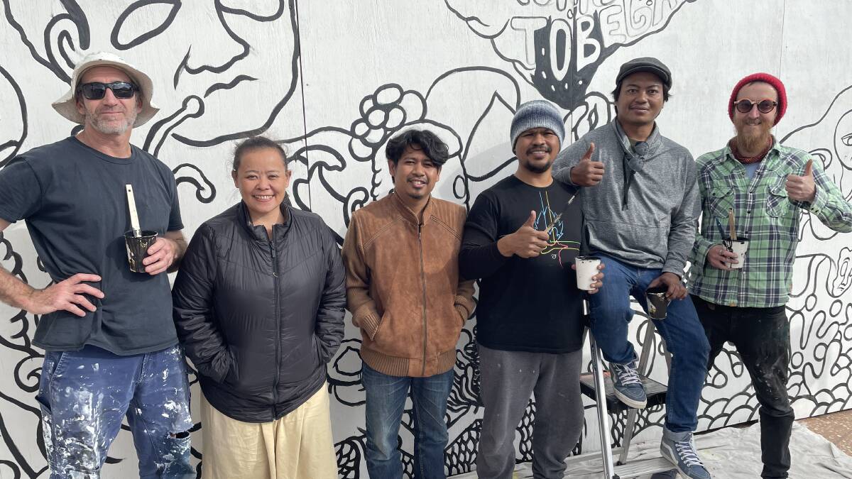 At work on the mural are Stan Squire, Kultura Collectiva members Dewi Bukit, Jaeko Siena, Andika Ananda and Dias Prabu, and Mike Barnard. Photo: Ben Smyth