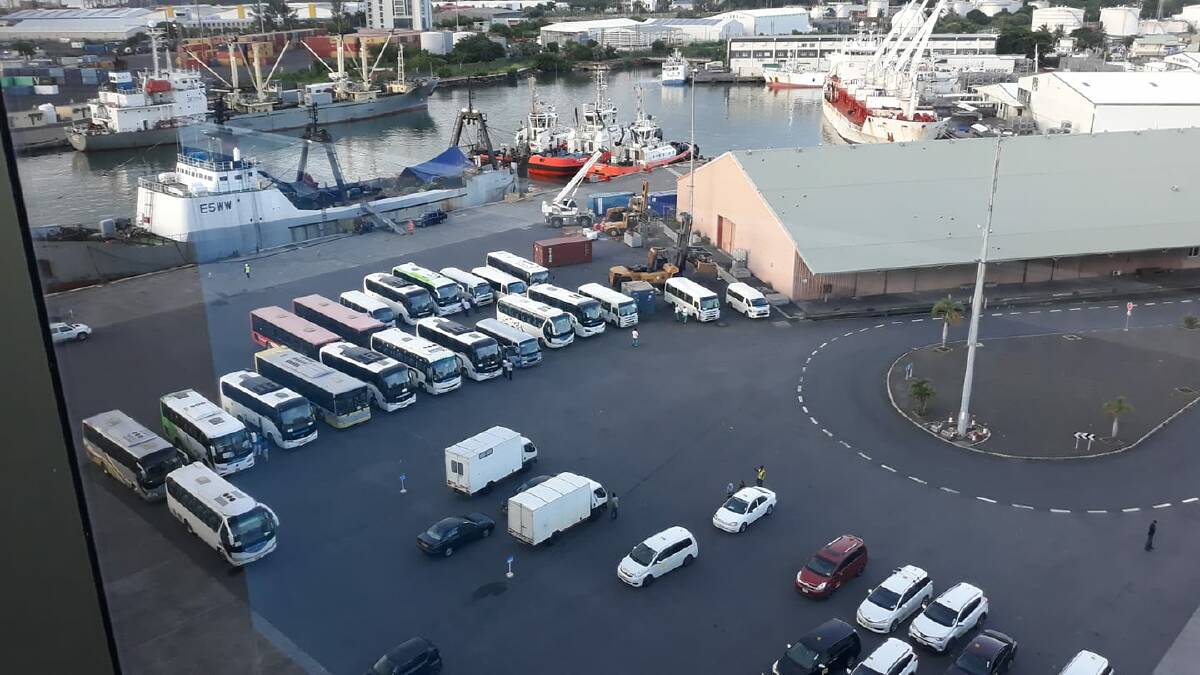 The ship was due to leave an hour ago, then the car park began filling with buses.