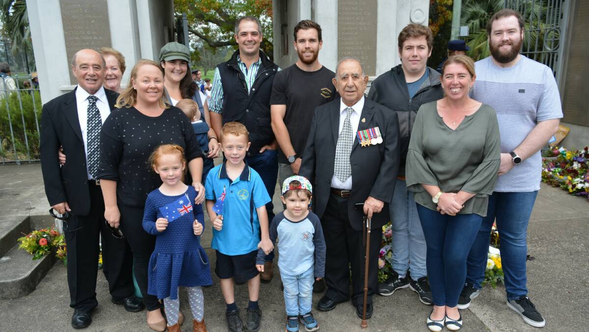 Claude Hayson, 95, with his family at the 2019 Bega Anzac Day service. Photo: Ben Smyth