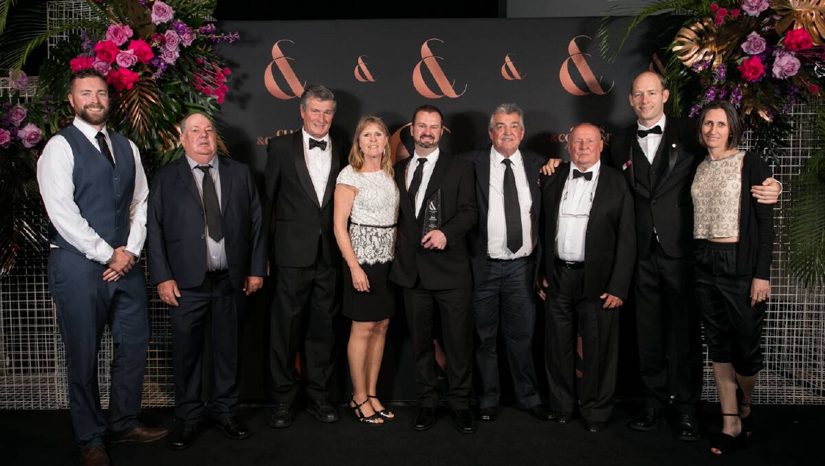 The team from Tathra Beach Bowling Club and Team Rubicon celebrate at the recent Clubs and Community Awards night in Sydney.