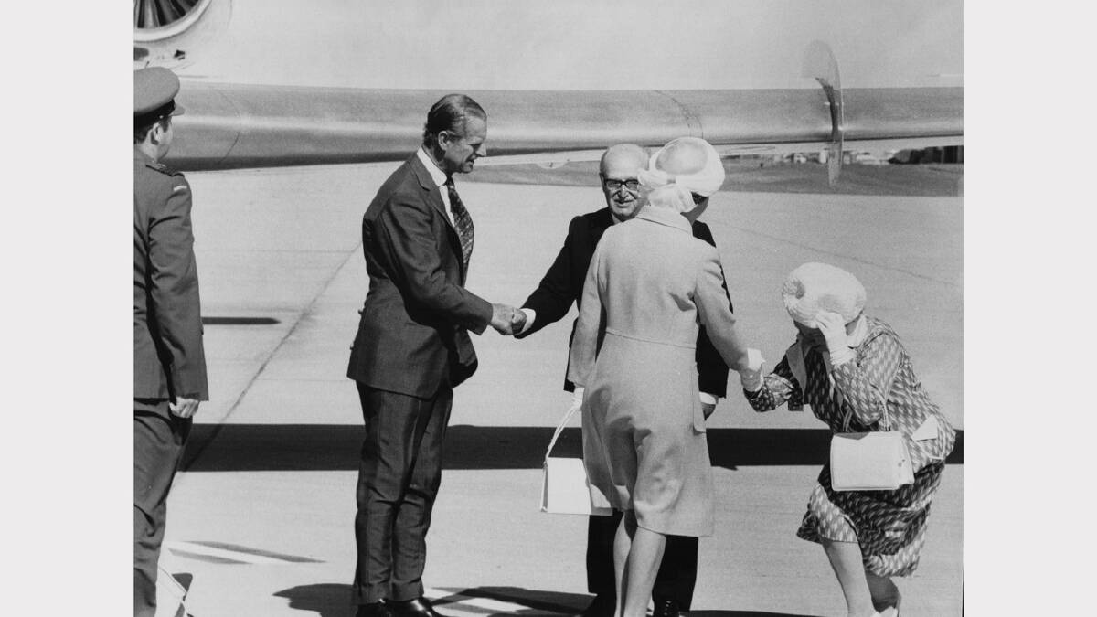 Queen Elizabeth and Prince Philip are met by Sir Stanley Burbury and Lady Burbury upon arrival in Launceston, Tasmania during their 1977 visit. File picture, www.examiner.com.au 