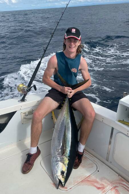First yellowfin of the season: 15 yr old Jack Pollock of Greig's Flat shows a lovely 28.1kg yellowfin taken off Merimbula.