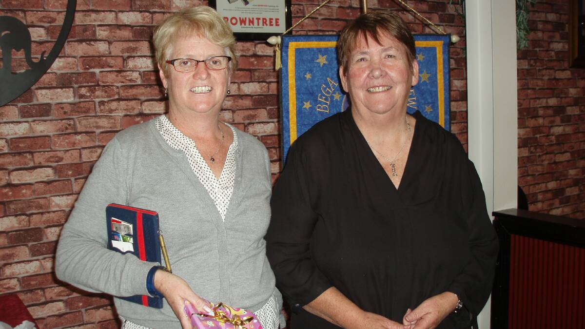 APPRECIATION: Bev Atkins, who was the guest speaker at last month's VIEW dinner, accepts a gift of appreciation from club member Lyn Ryan.