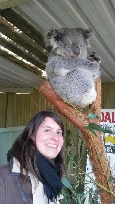 CAMPAIGNER: Julie Courtemanche says hello to the koala Sapphire at Potoroo Palace. Picture: John Marsh 