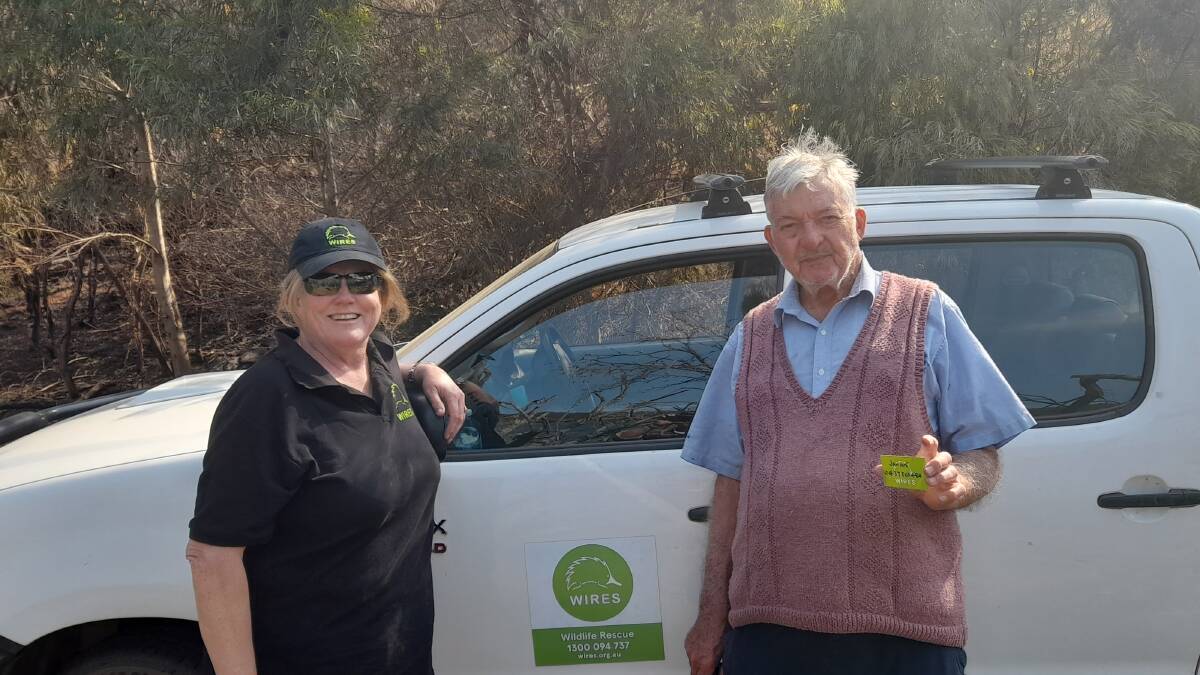 WIRES Far South East's Janine Green with Raymond Harrop, who lost his boatshed in the Cuttagee bushfire and reported a burnt kangaroo. Picture supplied