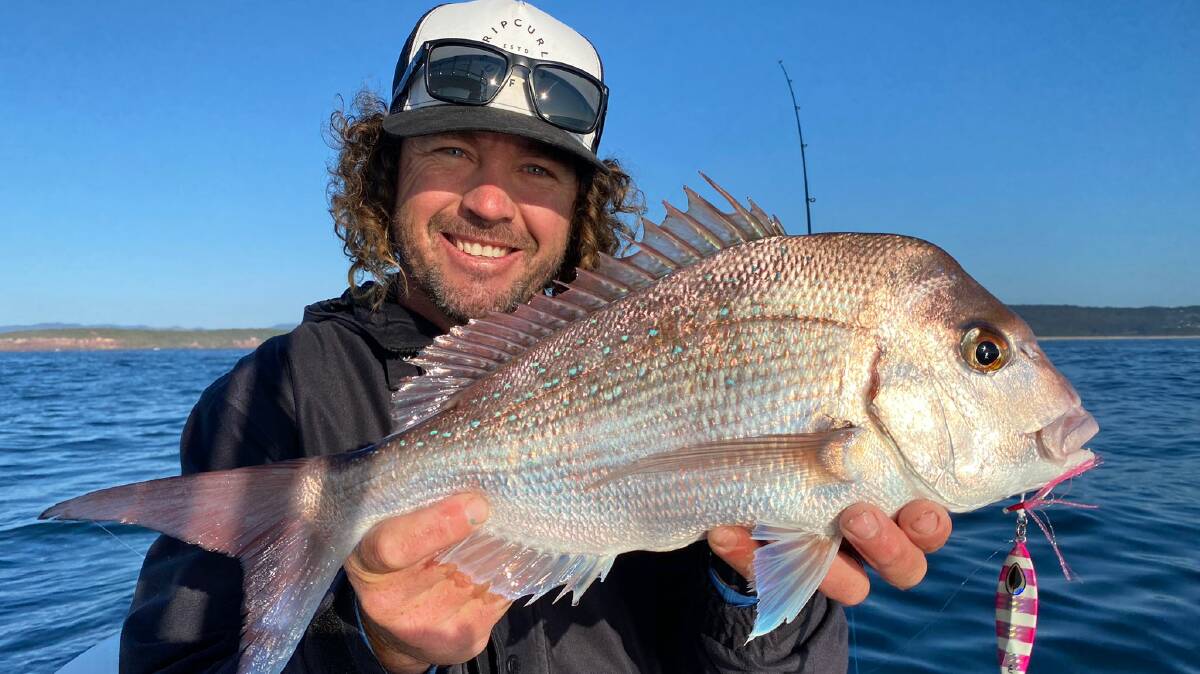 CATCH OF THE DAY: Andrew Badullovich shows a lovely local snapper taken using a micro jig off Long Point.