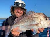 CATCH OF THE DAY: Andrew Badullovich shows a lovely local snapper taken using a micro jig off Long Point.
