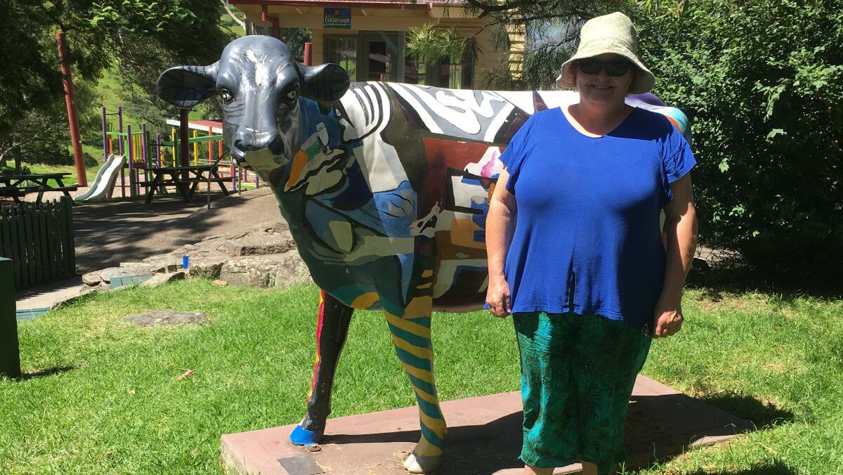Annette Kennewell a member of the CWA Bega Conference local organising committee with The Picasso Cow Grand Champion created by the Primary Class of Central Tilba Public School in 2010 for another dairy industry competition.