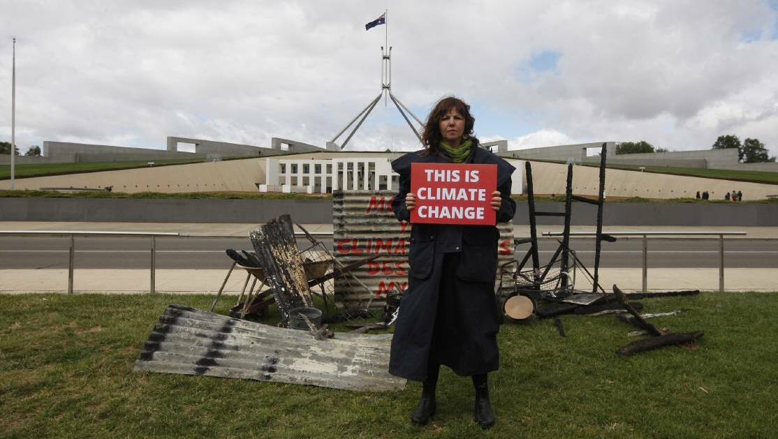 President of Bushfire Survivors for Climate Action Jo Dodds outside Parliament House. Picture: Dean Sewell/Greenpeace
