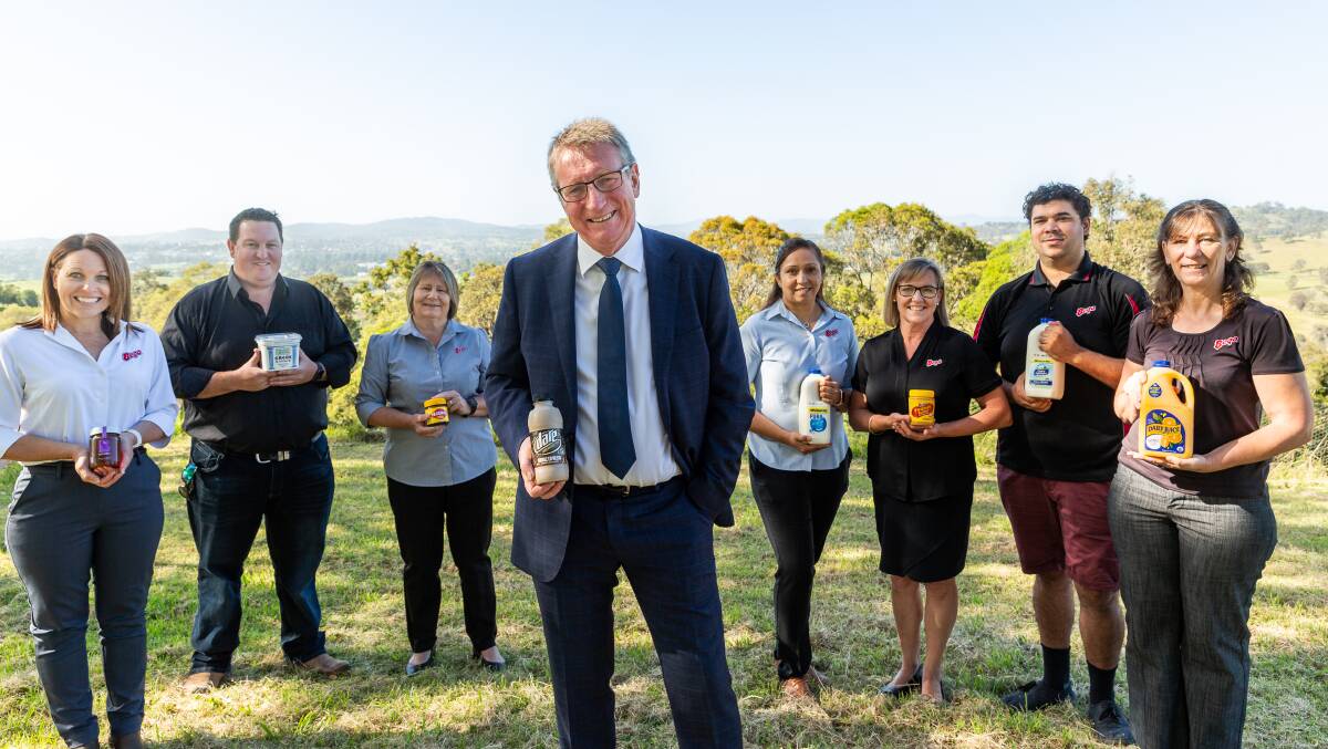 Bega executive chairman Barry Irvin with members of the Bega team celebrate the completion of the Dairy and Drinks acquisition. Photo: Supplied