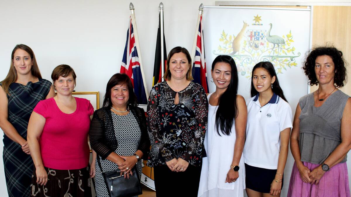 Mayor Kristy McBain (centre) congratulates new Australian citizens Chloe Garrs, Shannon Woloshyn, Flordeliza Grealy, Kunya Goddard, Siriwan Namlee and Suzanne Milligan.