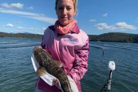  Jacqui Hancock of Millingandi shows off a lovely dusky flathead caught and released in Pambula Lake.