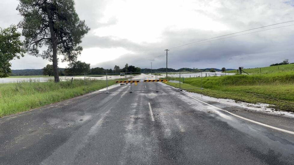 Tathra Road at Jellat is closed this morning due to flooding. Photo: Robert Jennings