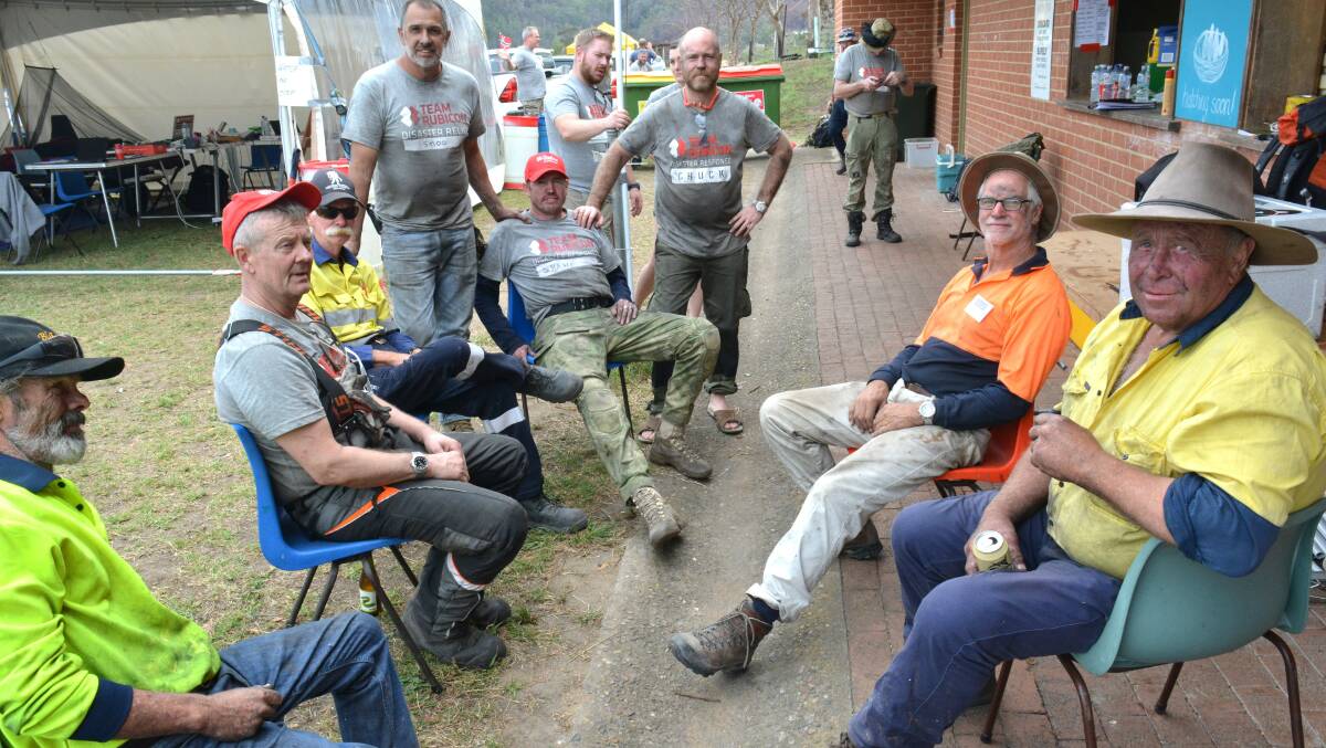 Barry (far right) after a big day leading a chainsaw accreditation workshop for Team Rubicon and BlazeAid volunteers.