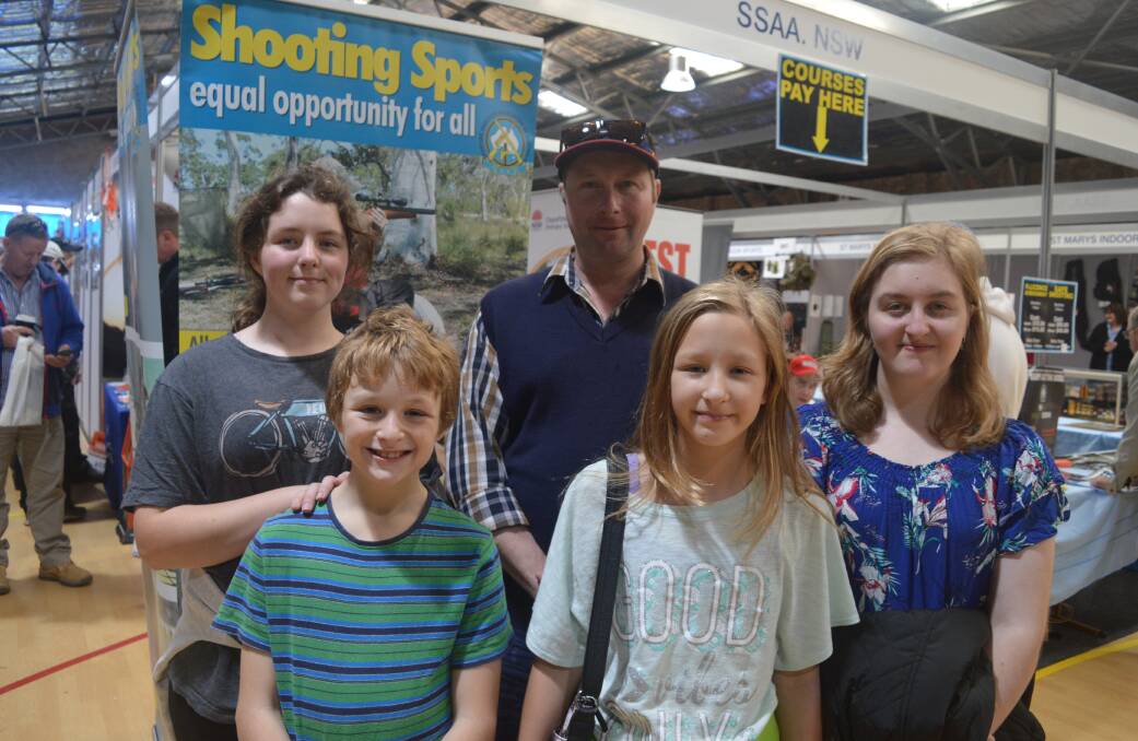 ​Glenn Collett of Bemboka with his children Hannah, Henry, Jana and Ebonny visited Narooma to have a look at HuntFest on Sunday.​