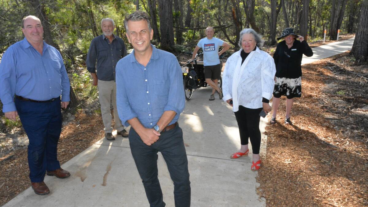 At the opening of the Tathra to Kalaru bike path are Mayor Russell Fitzpatrick, Bega MP Andrew Constance, Robert Hartemink, Doug Reckord, Prue Kelly and Cr Liz Seckold. Photo: Ben Smyth