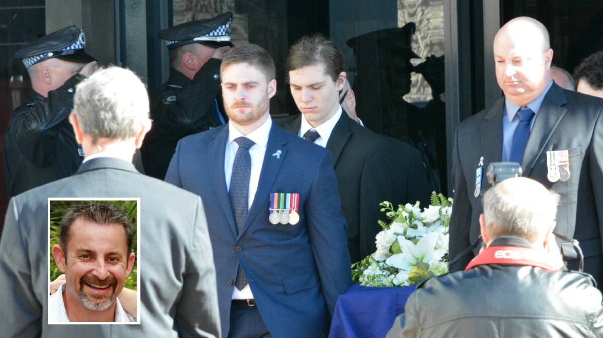 Michael Horne's son Tom and close friend Phil Hoy lead the pallbearers at the public memorial for the killed former police officer (inset).
