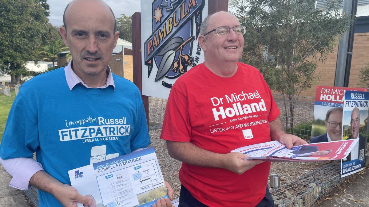 Election day volunteers Nathan O'Donnell and Gary Bruce at the Pambula Public School polling booth. Picture by Ben Smyth