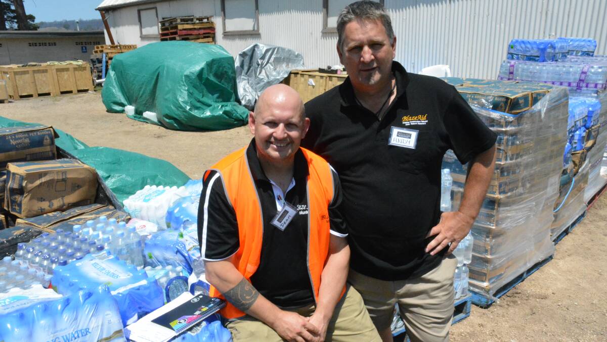 Volunteer army: Dean Brunton and Andy Welch from BlazeAid "will be here until the last farmer is helped". Photo: Ben Smyth